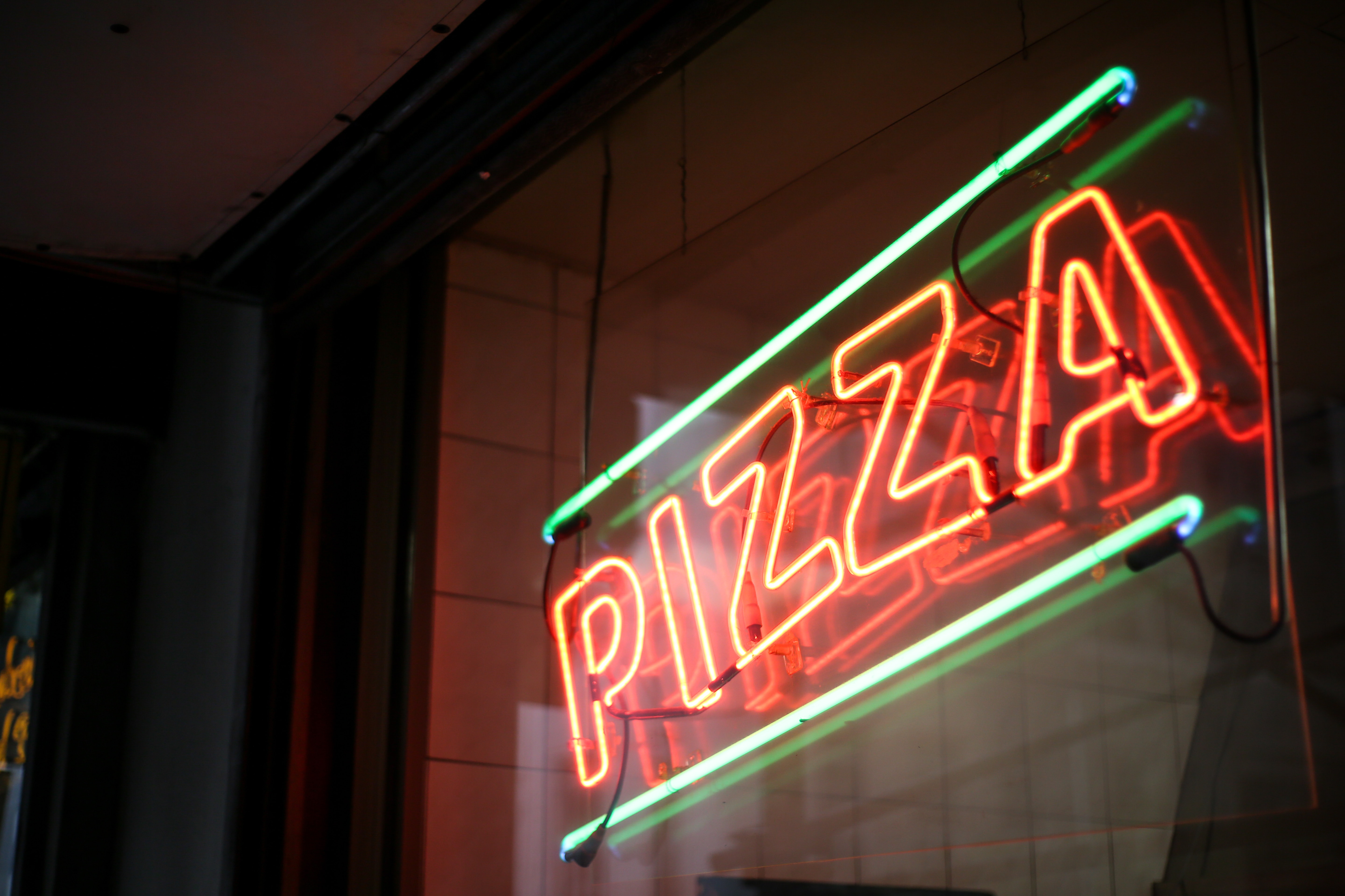 Foto door Giorgio Trovato op Unsplash. mmm, pizza.